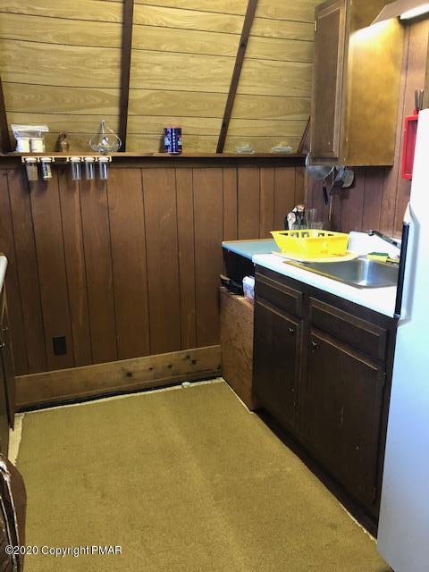 228 Haystack Road Henryville, PA 18332 - Photo 8 of 8 a bathroom with a sink and a mirror