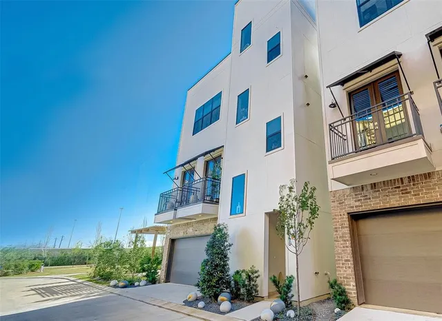 a view of a backyard with chair and table