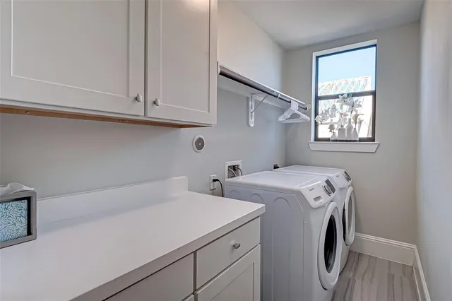 a terrace with outdoor seating and city view