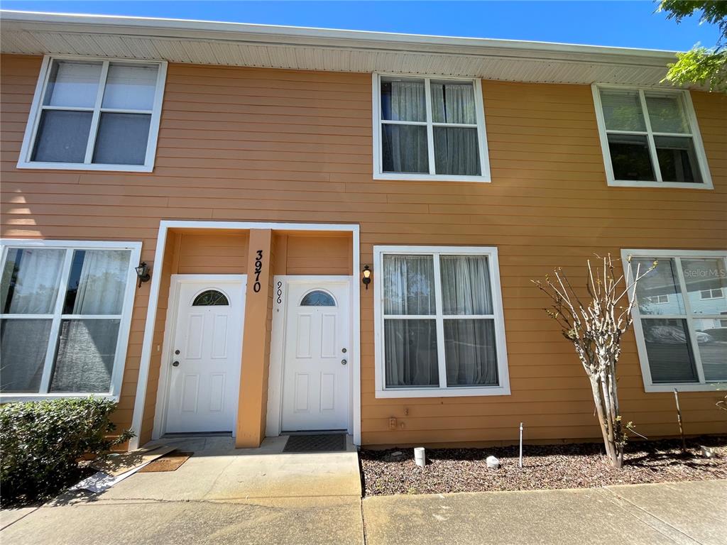 3970 Southwest 20th Avenue, Unit 906 Gainesville, FL 32607 - Photo 1 of 1 a front view of a house