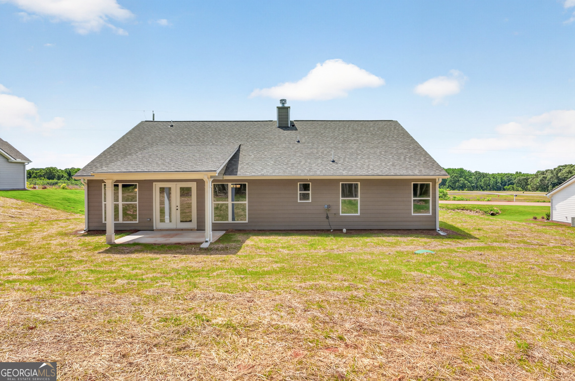 206 Airport Road, Unit 11 Canon, GA 30520 - Photo 4 of 34 a front view of a house with a yard