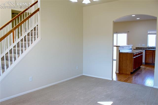 6112 Rocking Chair Lane Colorado Springs, CO 80925 - Photo 2 of 8 Dining to Stairs