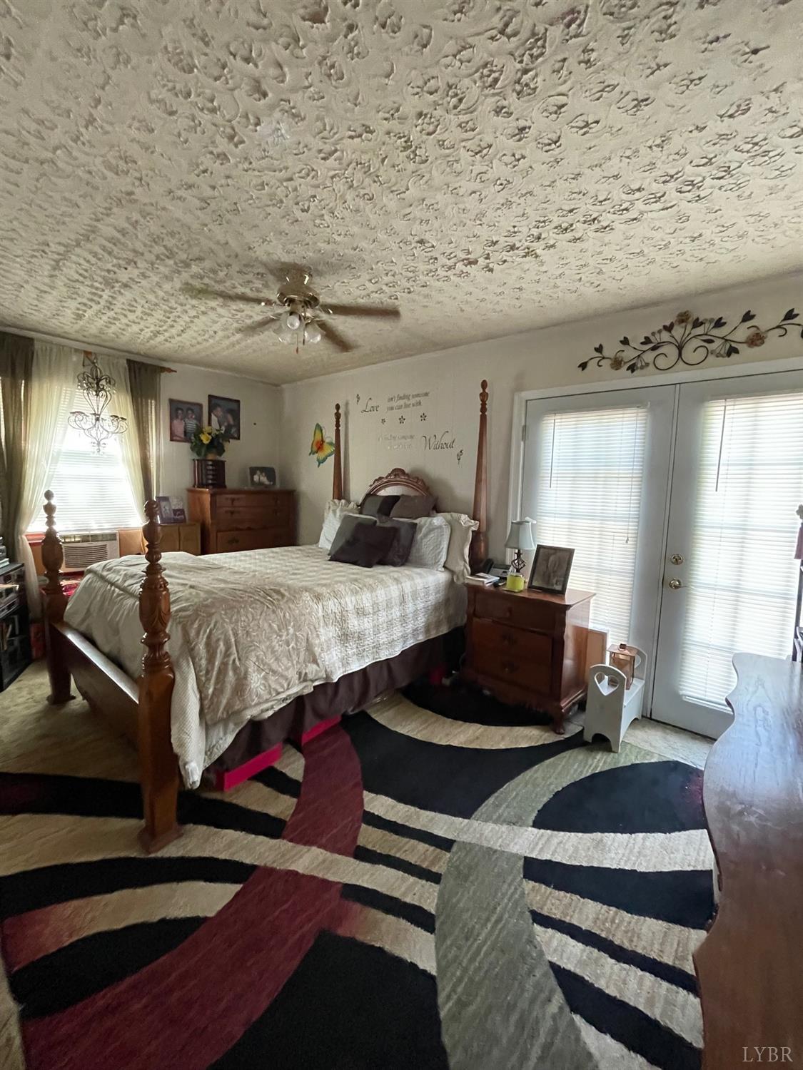 42 Pilot View Road Concord, VA 24538 - Photo 9 of 12 a bedroom with a bed and wooden floor