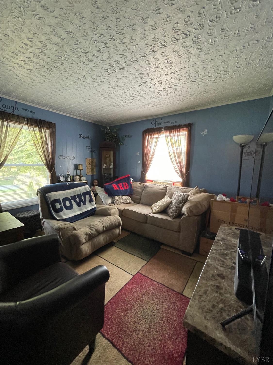 42 Pilot View Road Concord, VA 24538 - Photo 10 of 12 a living room with furniture and a large window