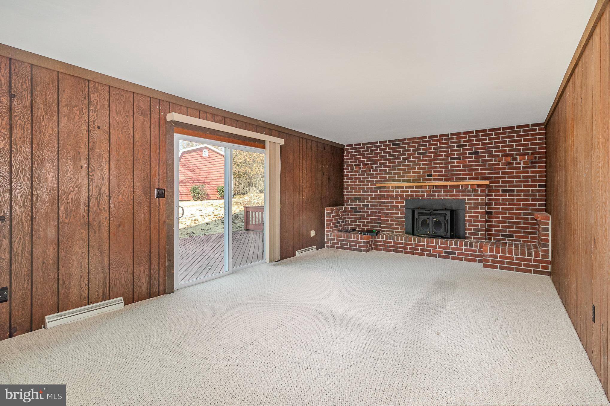2659 Ritner Highway Carlisle, PA 17015 - Photo 20 of 40 a view of empty room with a fireplace