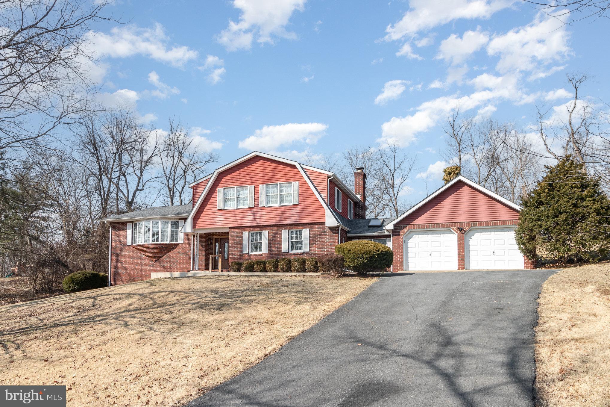 2659 Ritner Highway Carlisle, PA 17015 - Photo 2 of 40 a front view of a house with a yard