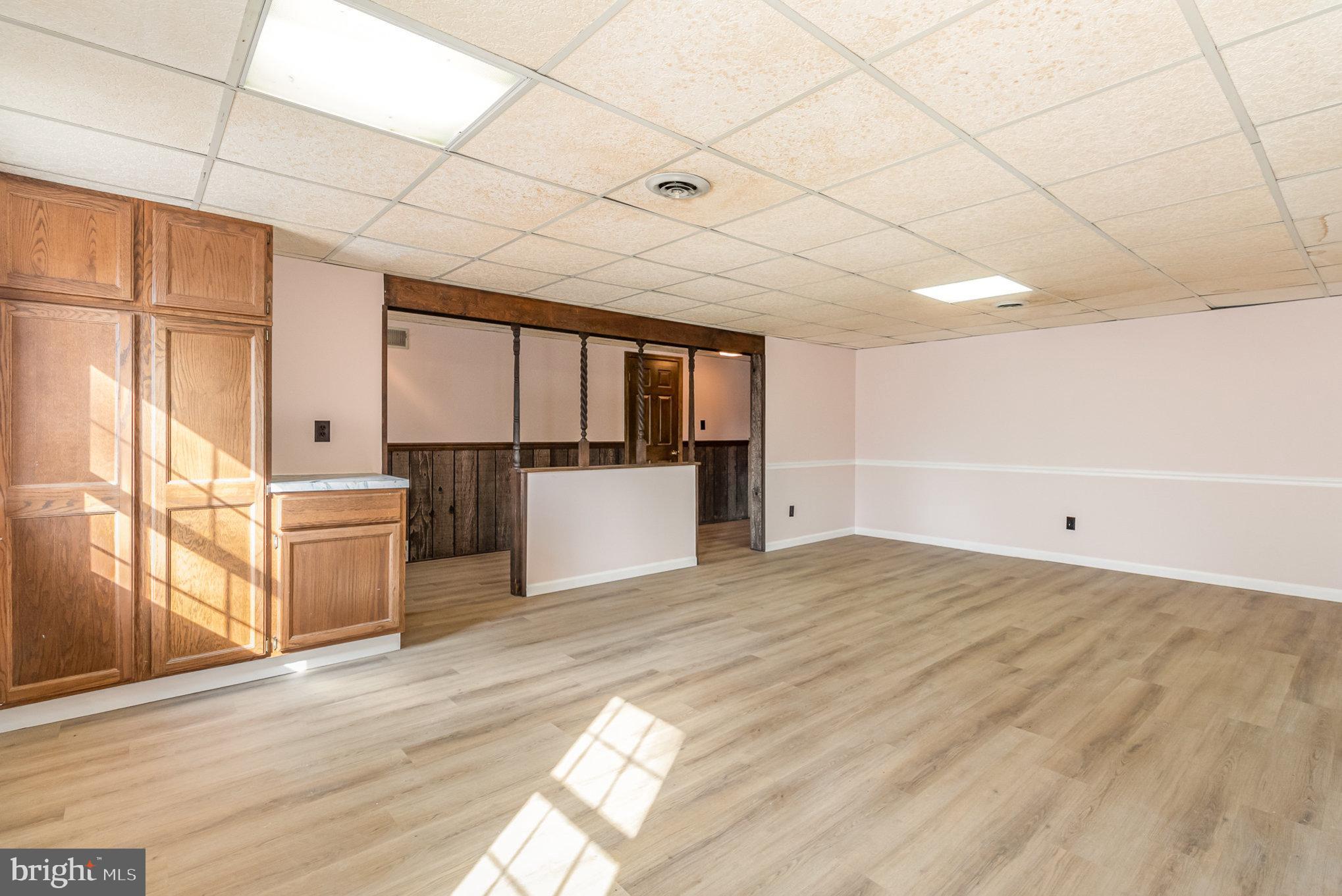 2659 Ritner Highway Carlisle, PA 17015 - Photo 25 of 40 a view of a kitchen with a sink and a refrigerator
