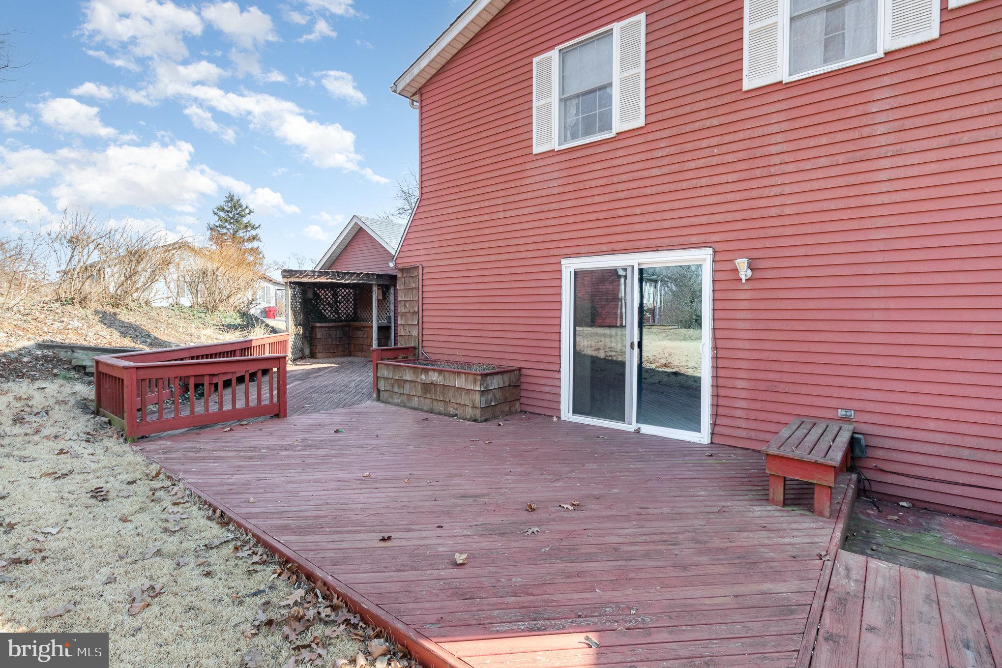 2659 Ritner Highway Carlisle, PA 17015 - Photo 30 of 40 a view of a chairs with a bench in wooden floor
