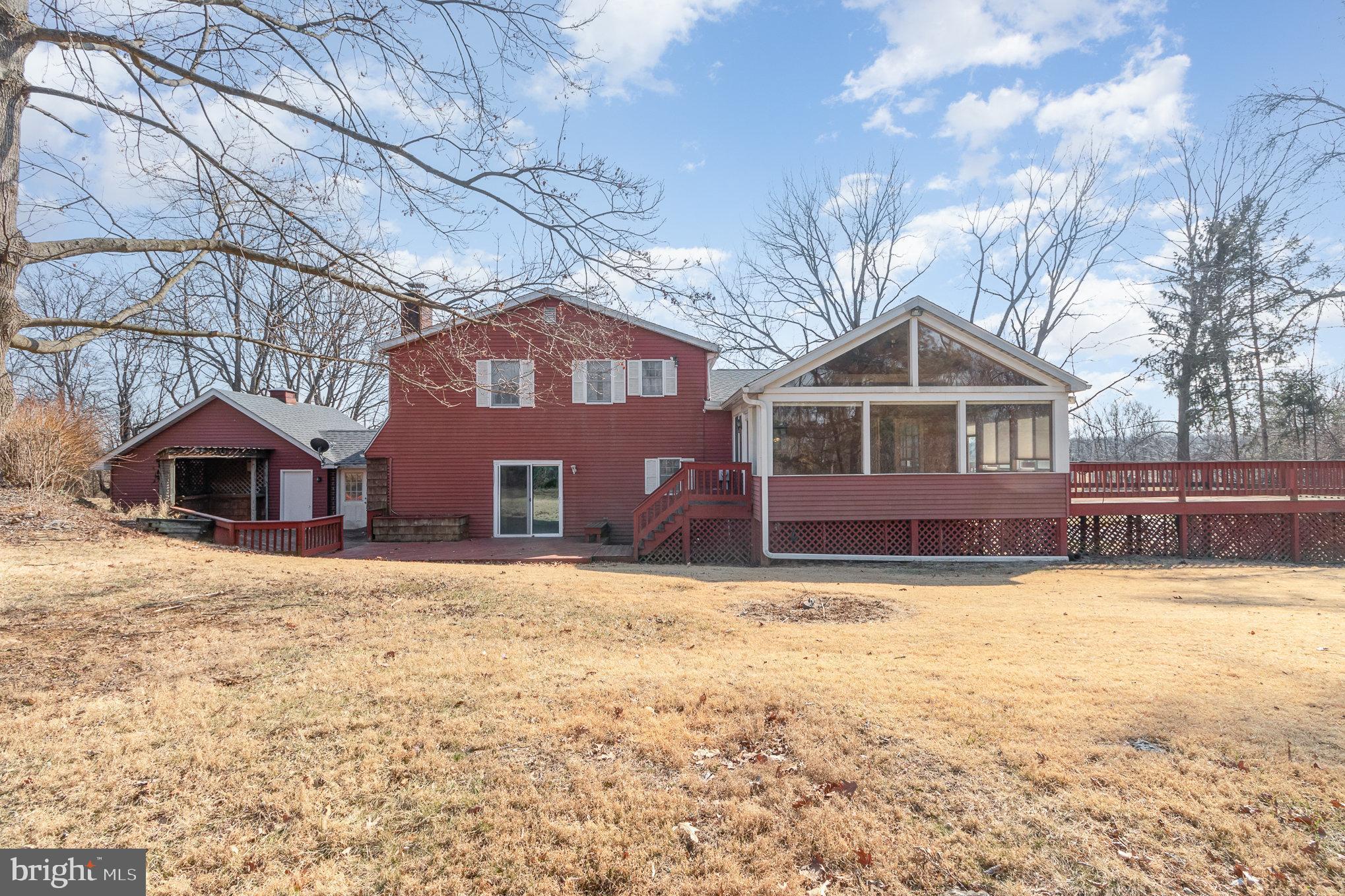 2659 Ritner Highway Carlisle, PA 17015 - Photo 32 of 40 a front view of a house with a yard covered in snow