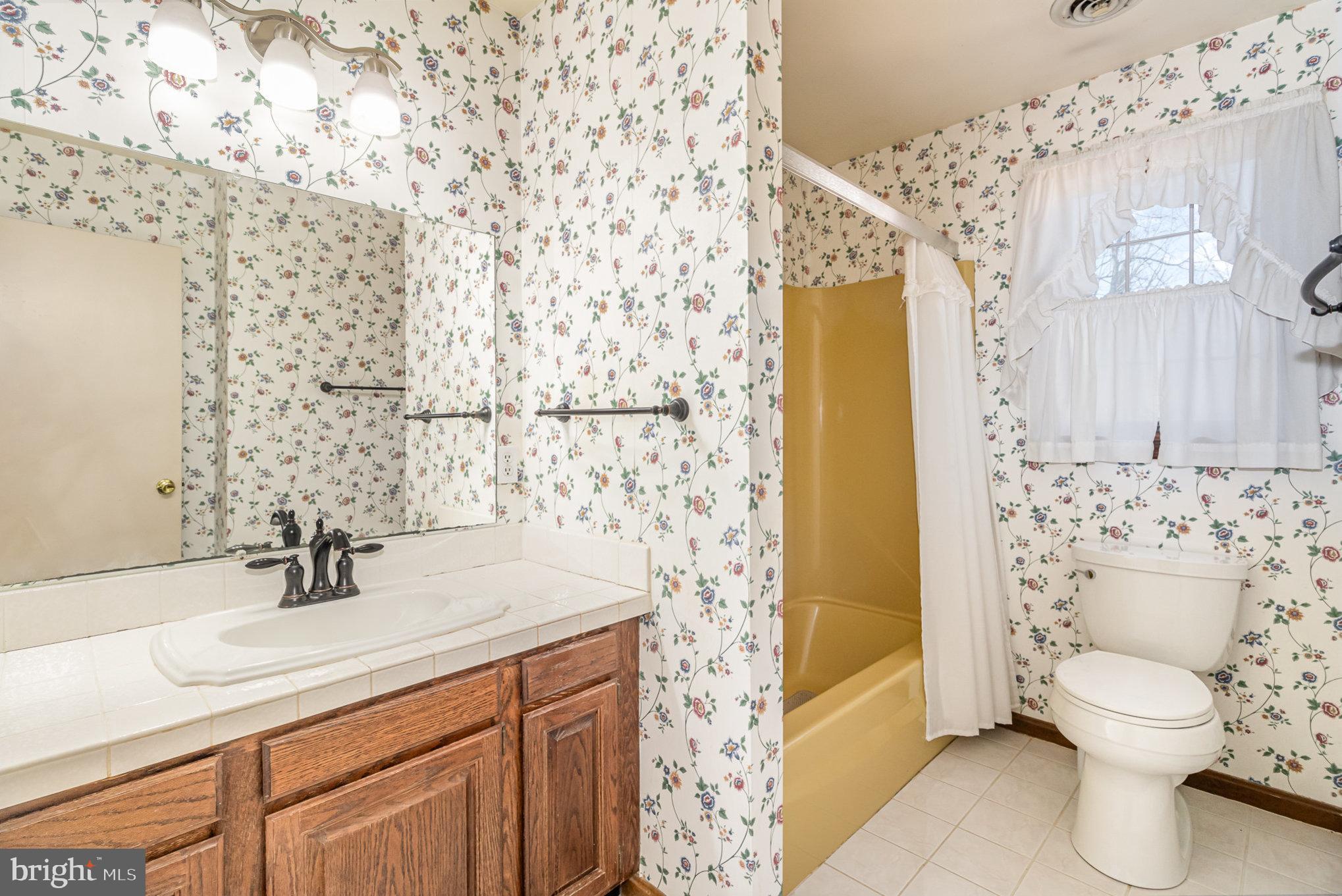 2659 Ritner Highway Carlisle, PA 17015 - Photo 10 of 40 a bathroom with a sink toilet and shower