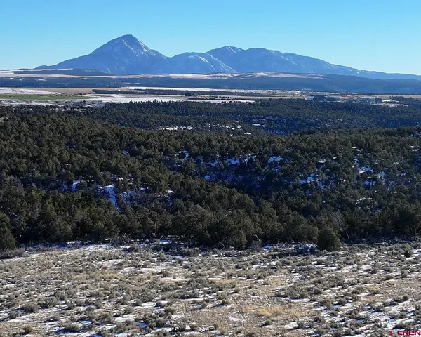 a view of a city with mountain