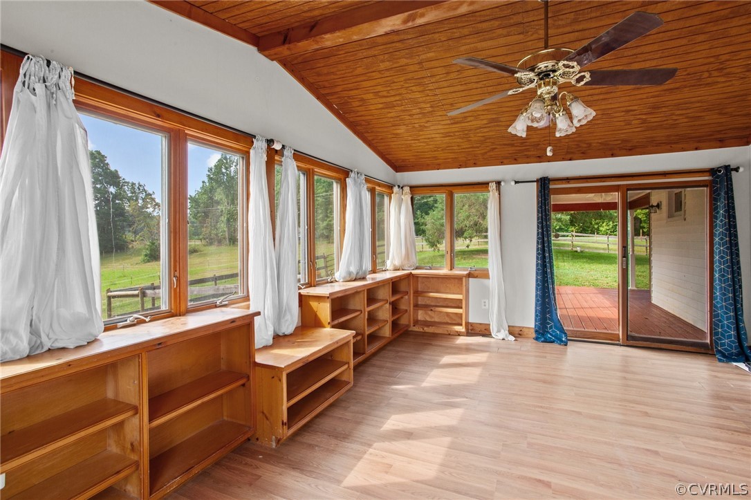 3115 Lewiston Road Bumpass, VA 23024 - Photo 18 of 43 a spacious bedroom with a large bed and a large window with pool view