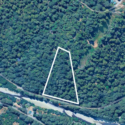 a view of backyard with green space