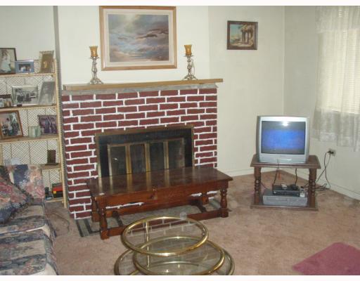 3446 Frazier Street Pittsburgh, PA 15213 - Photo 3 of 18 Living Room. This large room provides great entertaining space. Fireplace is decorative.