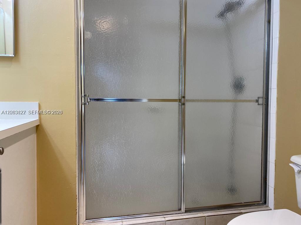 8060 North Nob Hill Road, Unit 203 Tamarac, FL 33321 - Photo 19 of 69 a view of bathroom