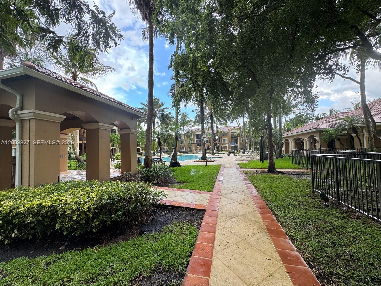 8060 North Nob Hill Road, Unit 203 Tamarac, FL 33321 - Photo 50 of 69 a view of park with large trees
