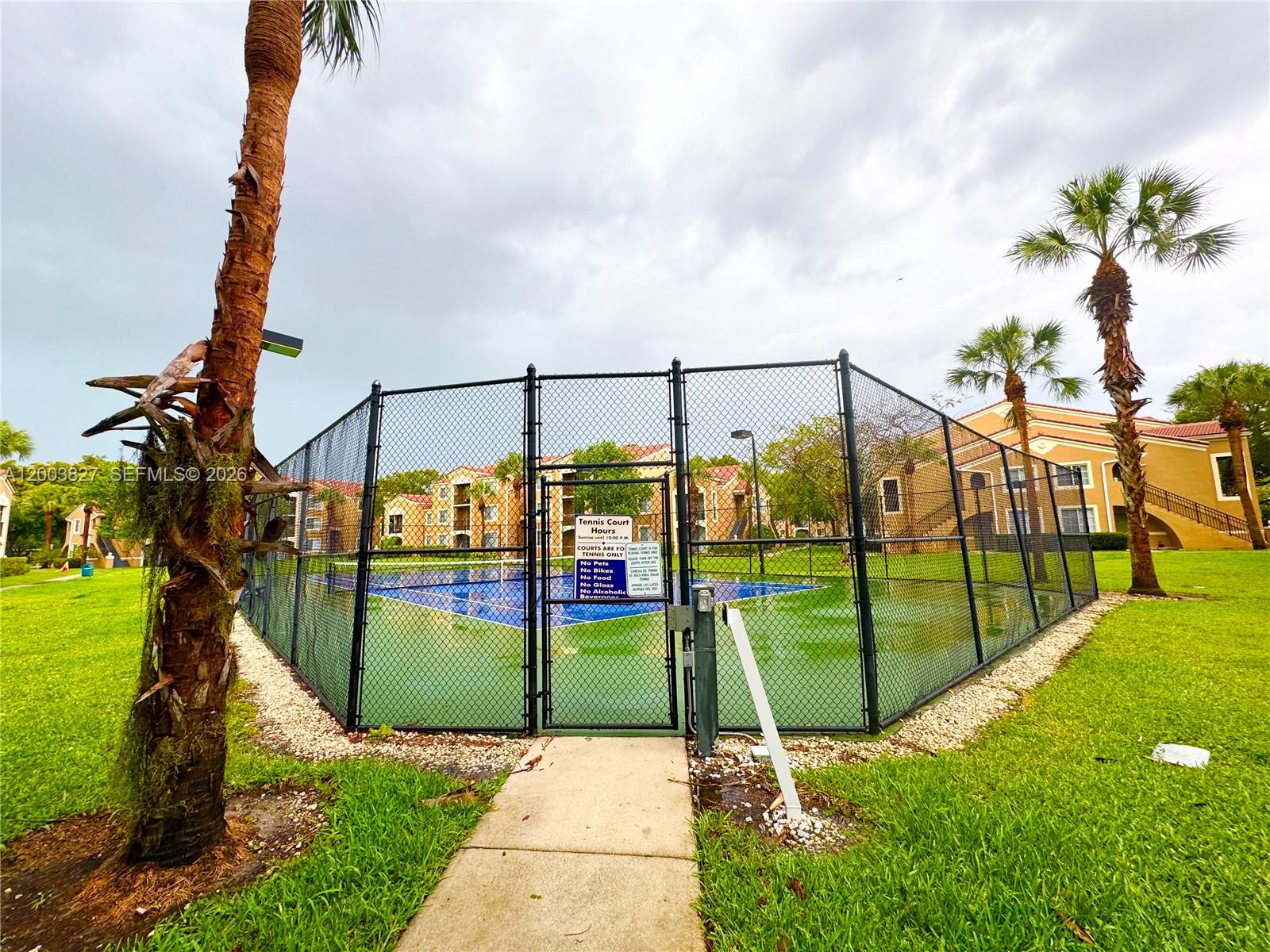 8060 North Nob Hill Road, Unit 203 Tamarac, FL 33321 - Photo 53 of 69 a view of a park with swings