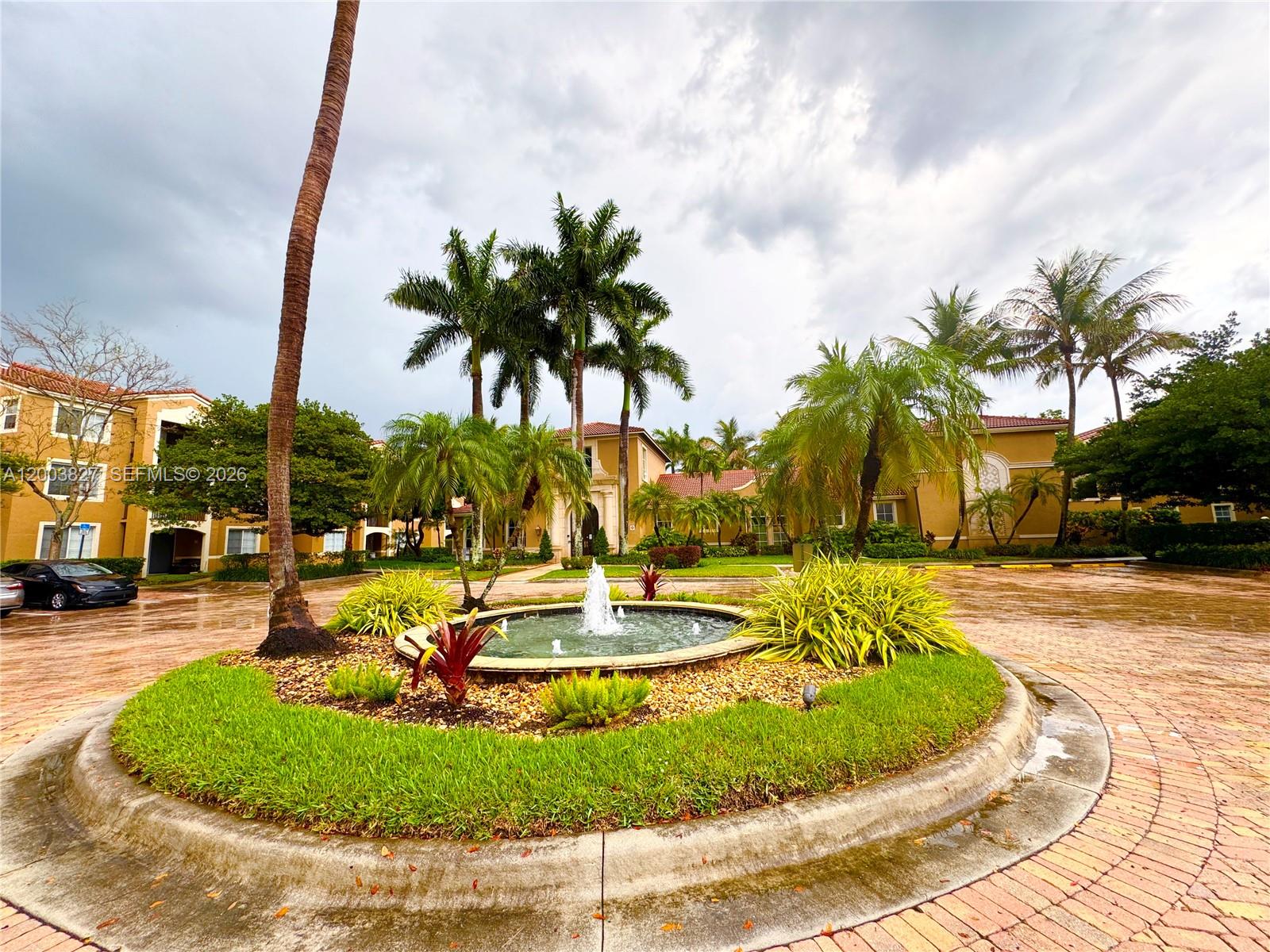 8060 North Nob Hill Road, Unit 203 Tamarac, FL 33321 - Photo 55 of 69 a view of a swimming pool with a patio
