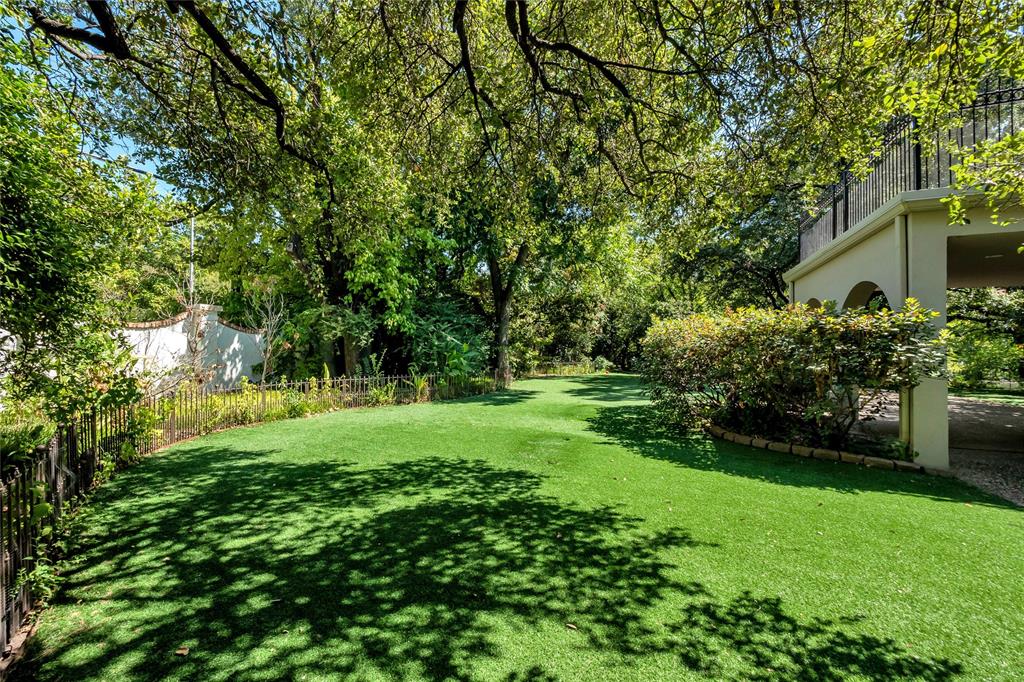 9909 Preston Road Dallas, TX 75230 - Photo 11 of 22 a view of backyard with green space