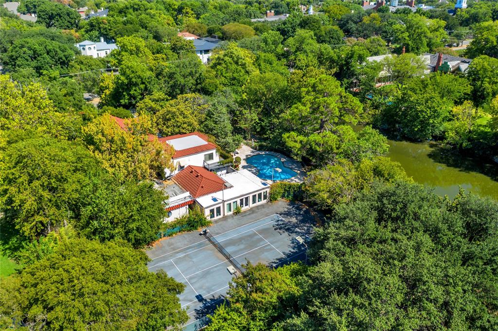 9909 Preston Road Dallas, TX 75230 - Photo 5 of 22 an aerial view of a house with a yard