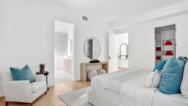 a bed room with a bed and a couch