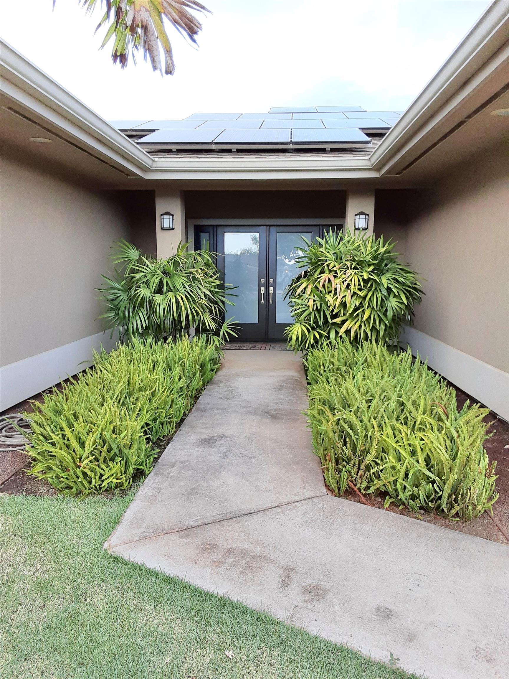 80 Koani Loop Wailuku, HI 96793 - Photo 2 of 18 a front view of house with potted plant