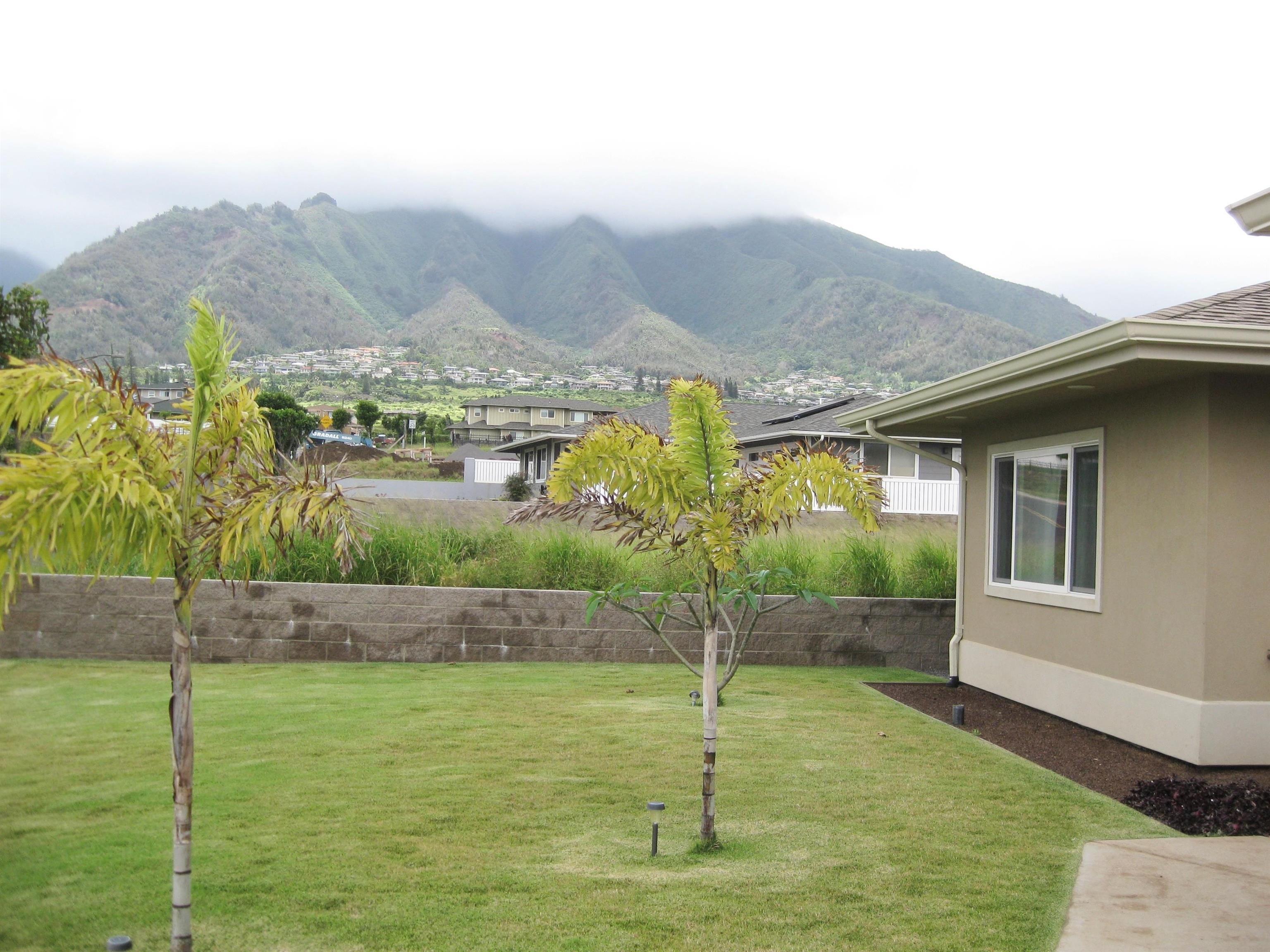 80 Koani Loop Wailuku, HI 96793 - Photo 6 of 18 a view of a house with a yard