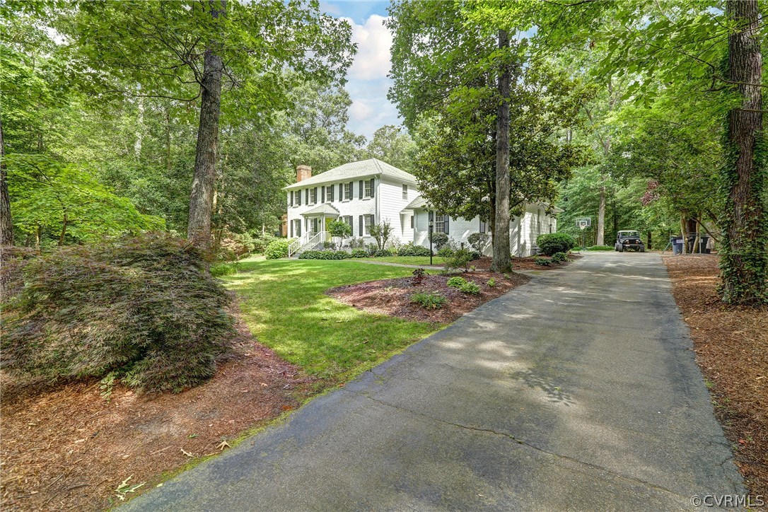 5810 Deep Forest Road North Chesterfield, VA 23237 - Photo 4 of 32 a front view of a house with a yard