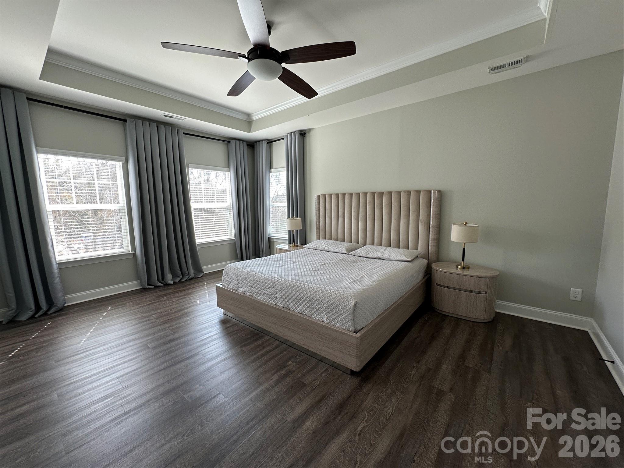 1004 Fallondale Road Waxhaw, NC 28173 - Photo 34 of 42 a spacious bedroom with a bed and a large window