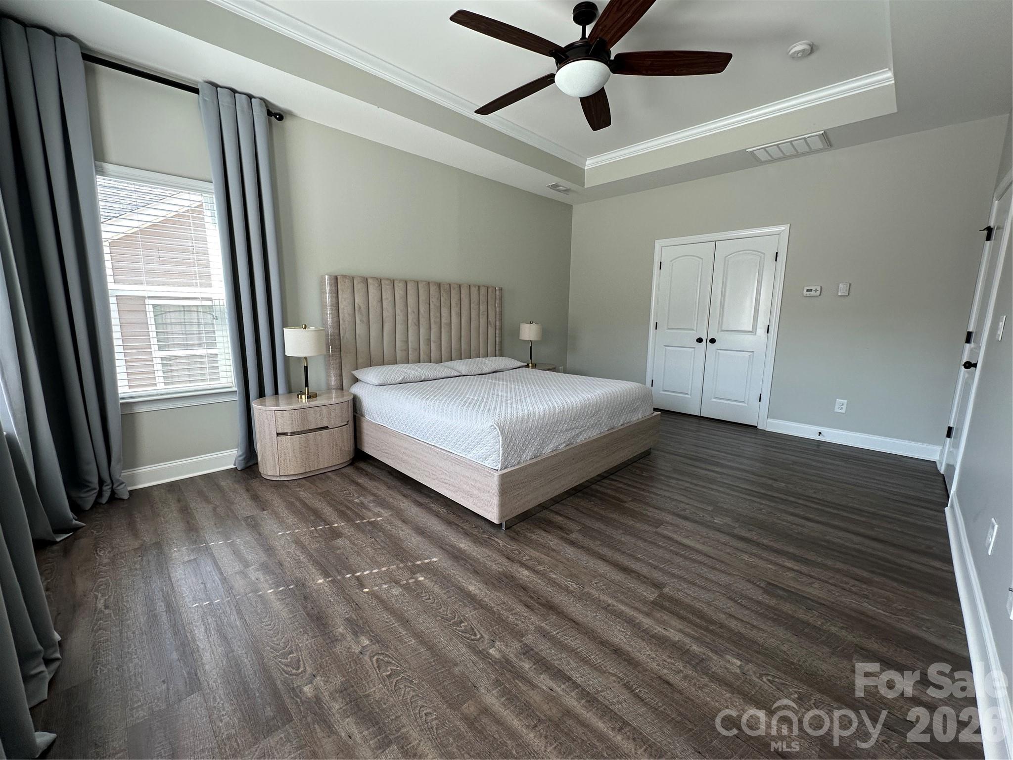 1004 Fallondale Road Waxhaw, NC 28173 - Photo 35 of 42 a bedroom with a bed and a large window