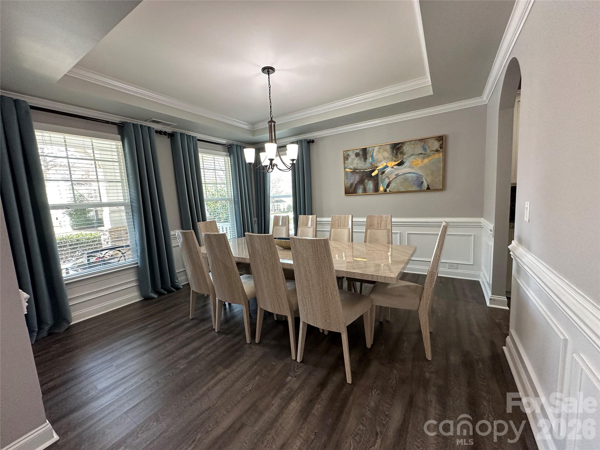 1004 Fallondale Road Waxhaw, NC 28173 - Photo 4 of 42 a view of a dining room with furniture wooden floor and chandelier