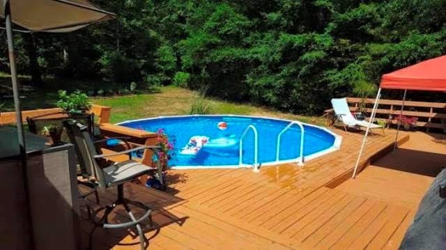 1151 Ridgeview Circle Macon, GA 31220 - Photo 22 of 23 a view of a swimming pool with a patio
