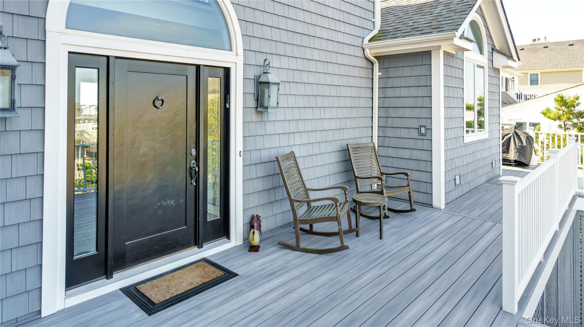 939 Dune Road West Hampton Dunes, NY 11978 - Photo 4 of 25 an outdoor view with patio