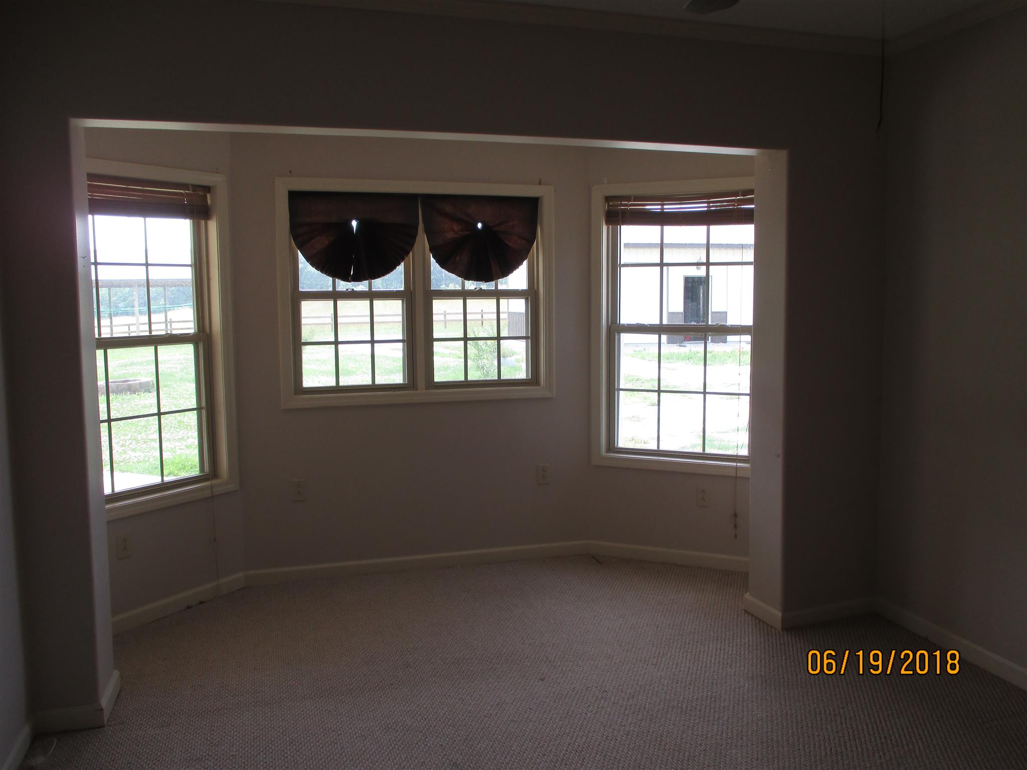 1089 Fall River Road Goodspring, TN 38460 - Photo 9 of 24 an empty room with windows