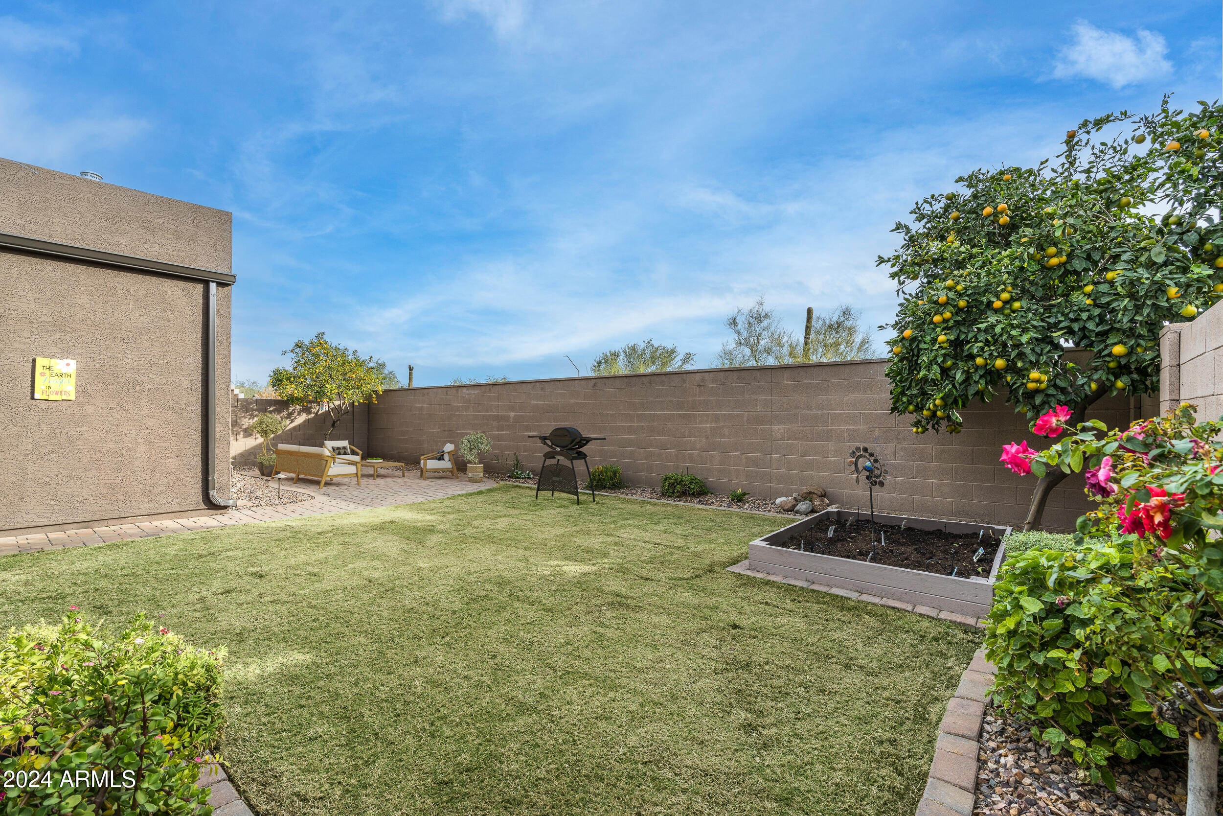 2605 West Florentine Road Phoenix, AZ 85086 - Photo 20 of 45 Take a moment to smell the roses.