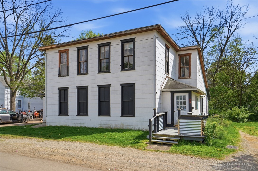 517 Broadway Street, Unit 515 Springfield, OH 45504 - Photo 3 of 29 This charming home features a classic exterior and a welcoming front porch, perfect for enjoying peaceful moments.