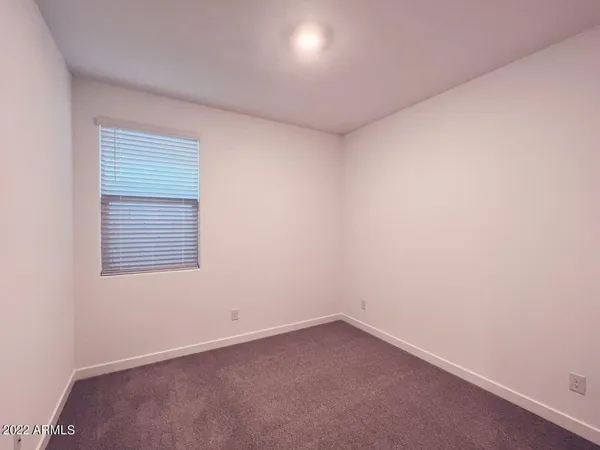 a bathroom with a sink a toilet a tub and shower