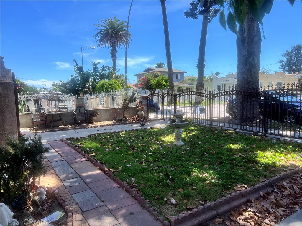 1009 East Stockton Street Compton, CA 90221 - Photo 12 of 14 a view of a garden