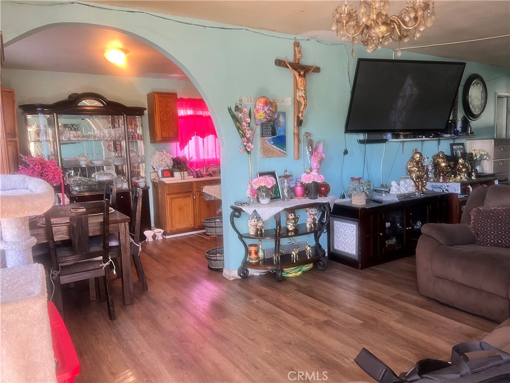 1009 East Stockton Street Compton, CA 90221 - Photo 7 of 14 a living room with furniture and a flat screen tv