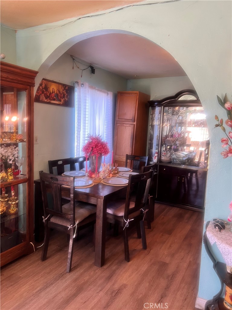 1009 East Stockton Street Compton, CA 90221 - Photo 8 of 14 a view of a dining room with furniture and window