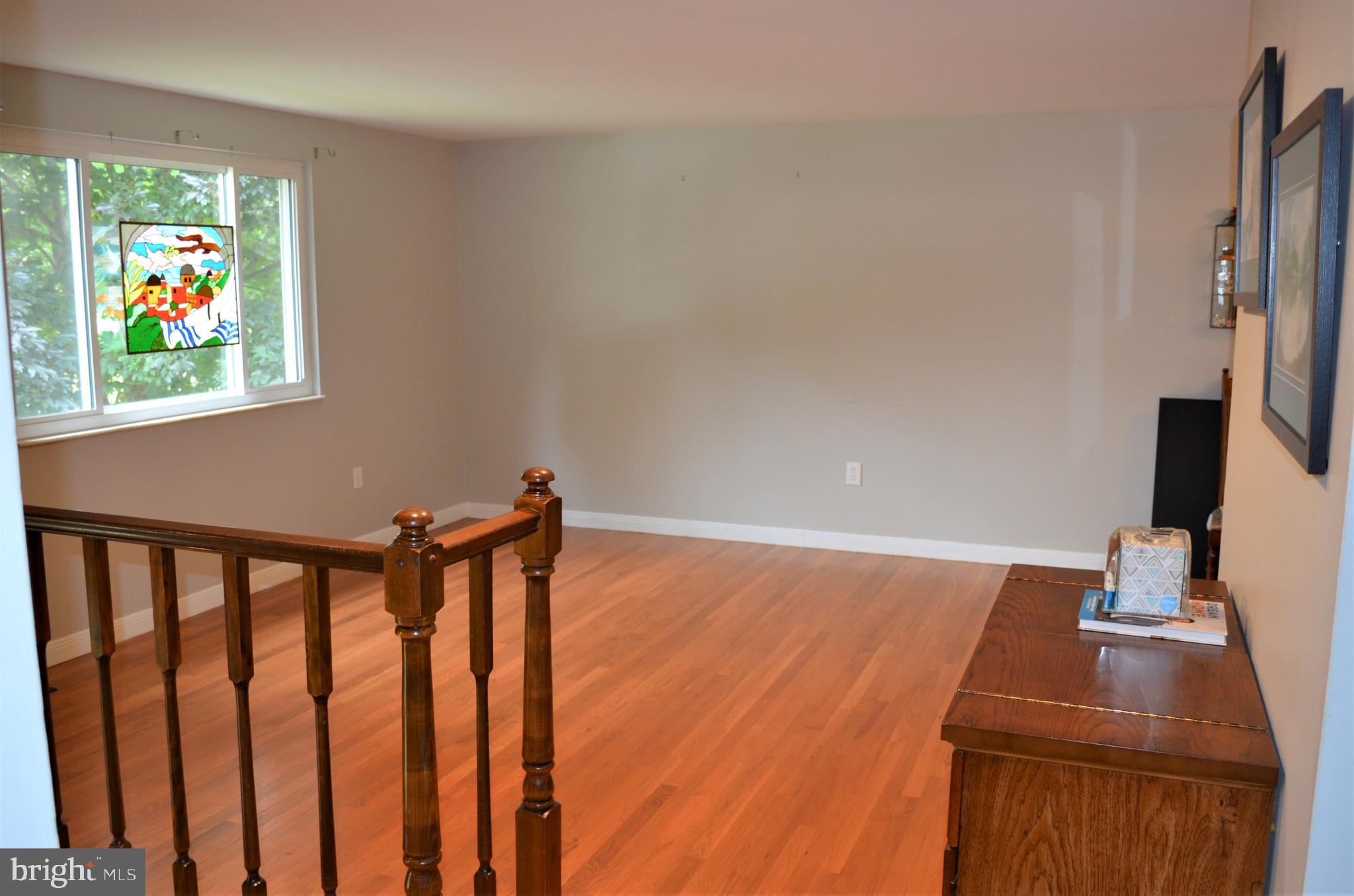 6502 Wrangell Road Bowie, MD 20720 - Photo 4 of 31 Open and bright Family Room with wood floors