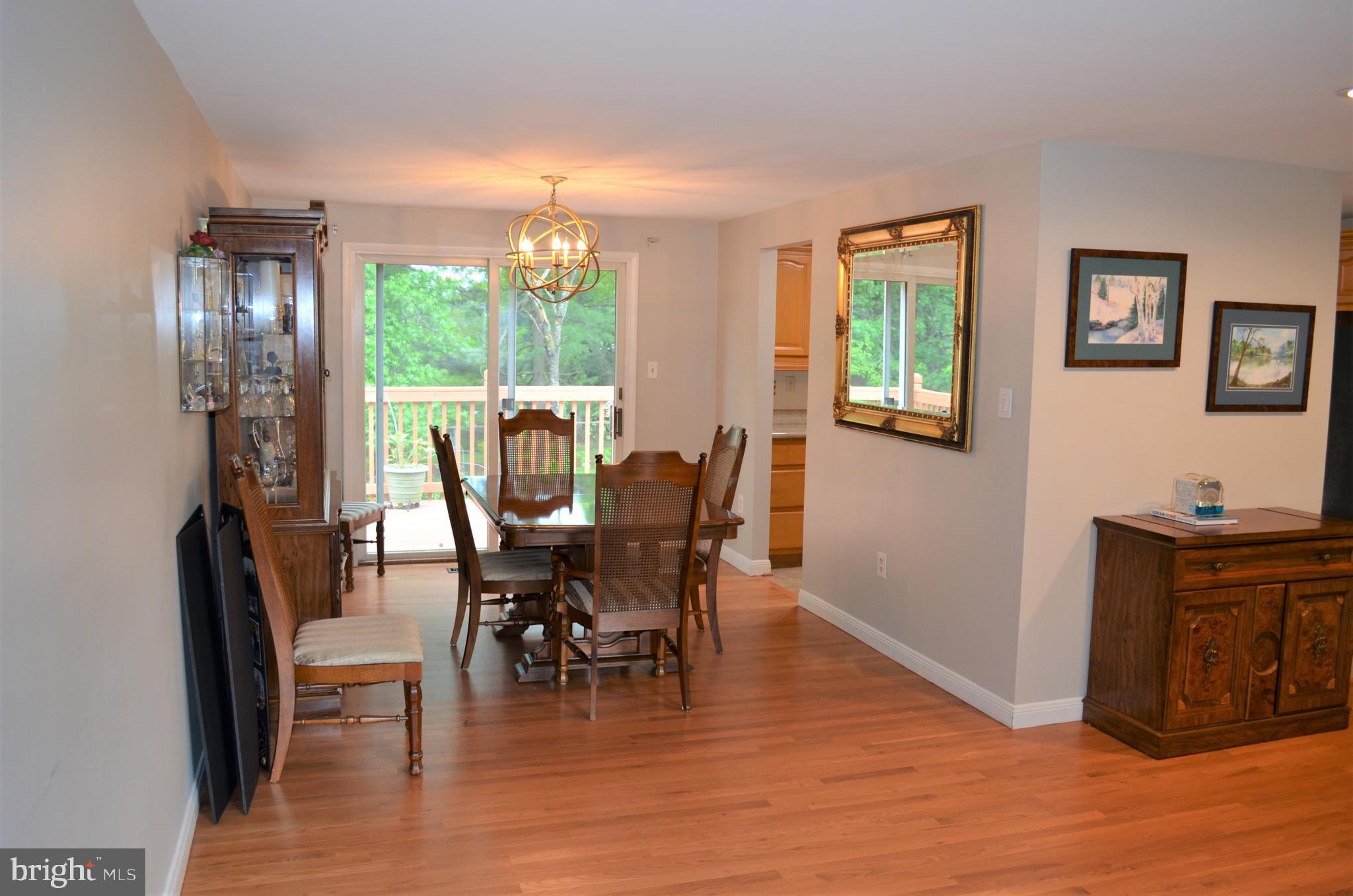 6502 Wrangell Road Bowie, MD 20720 - Photo 7 of 31 Family Room leading to the Din Room