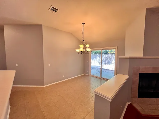 a view of a room with a chandelier