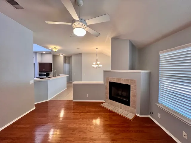a view of a living room and chandelier