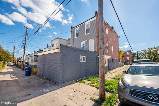 a view of a patio with a yard