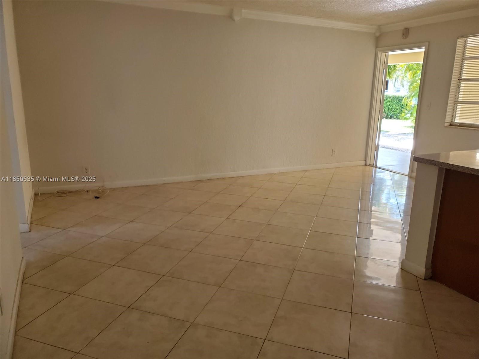 1100 Northeast 1st Court, Unit 106 Hallandale Beach, FL 33009 - Photo 5 of 16 a bathroom with a shower