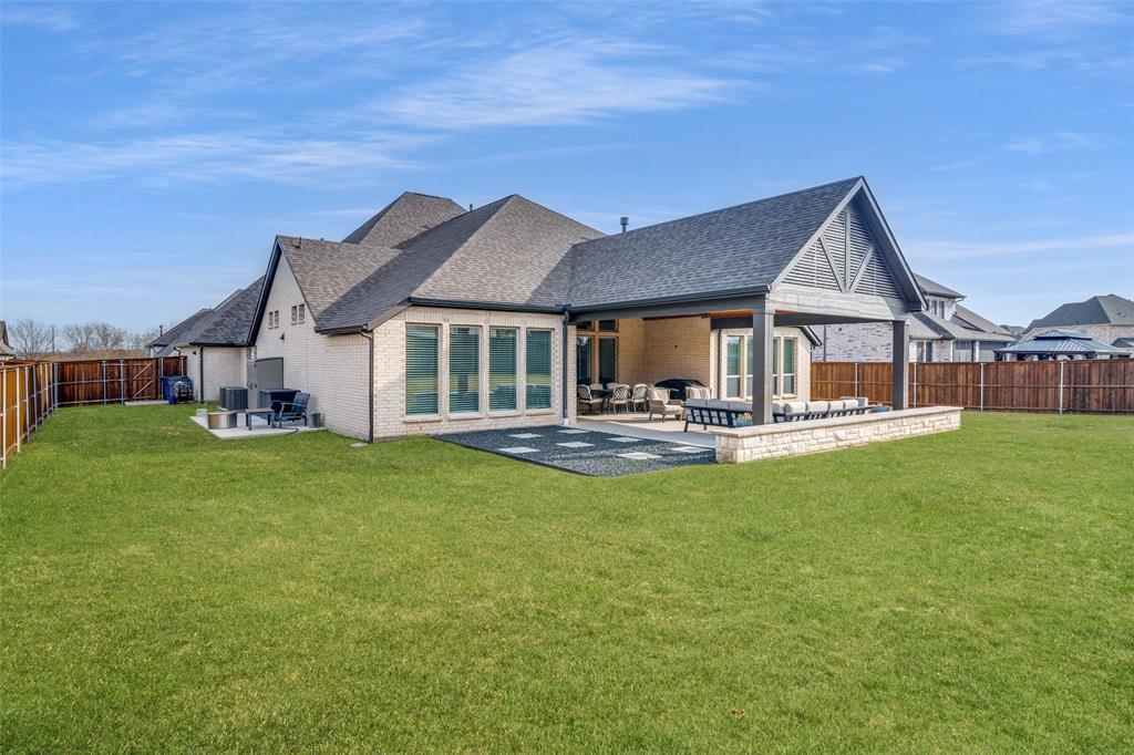 Amazing covered patio, private yard and huge side yard too! 