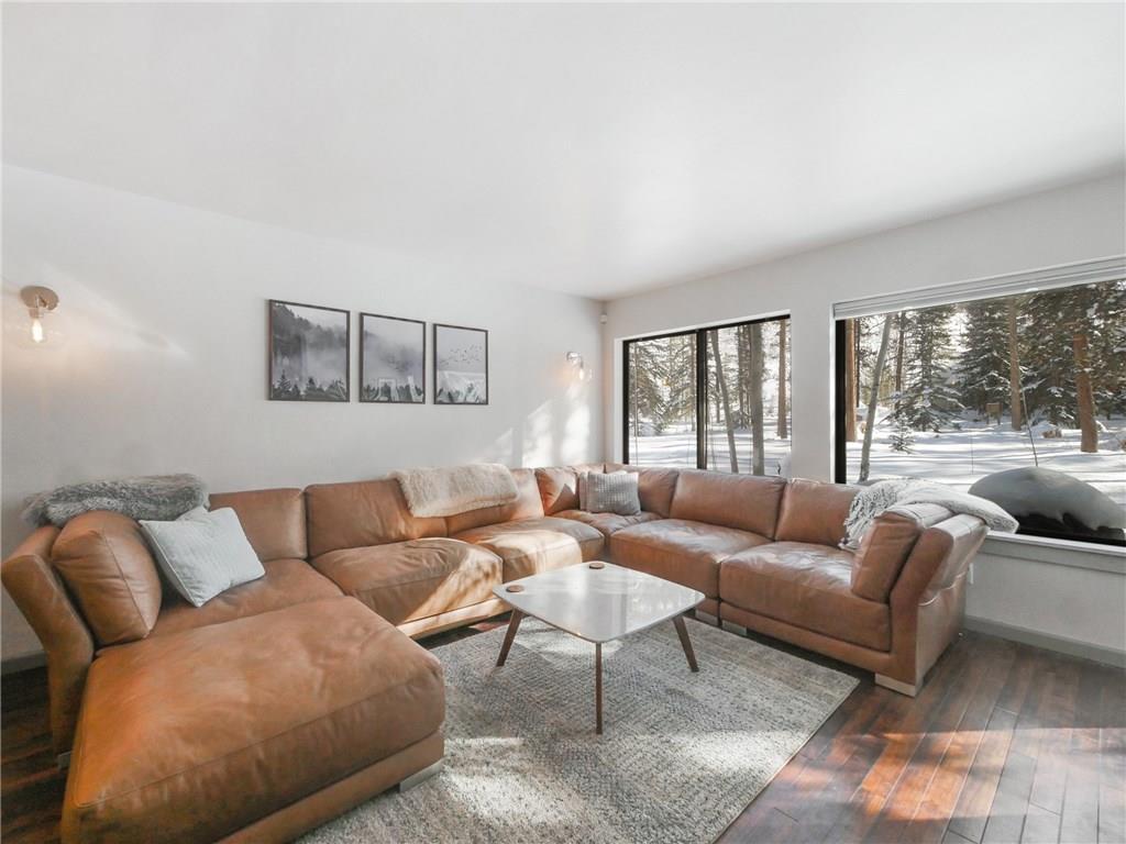 1928 Soda Ridge Road, Unit 1225 Keystone, CO 80435 - Photo 13 of 33 a living room with furniture and a large window