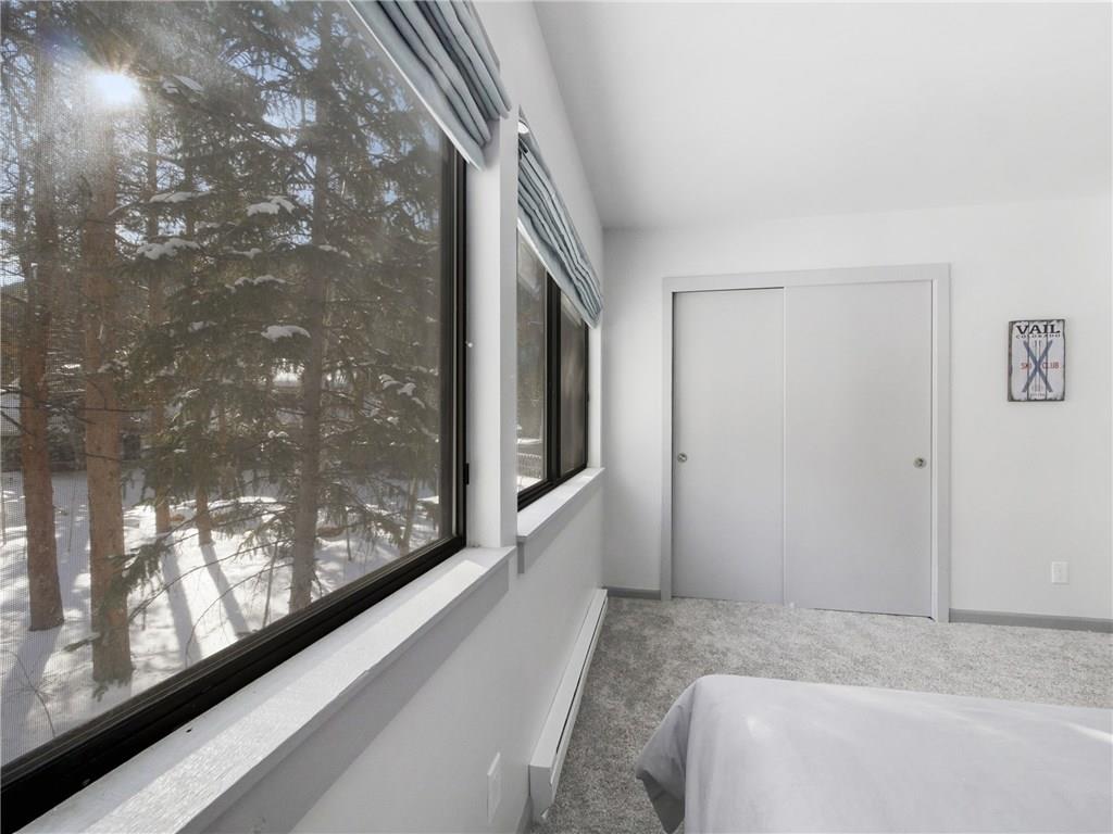 1928 Soda Ridge Road, Unit 1225 Keystone, CO 80435 - Photo 22 of 33 a view of a hallway with window