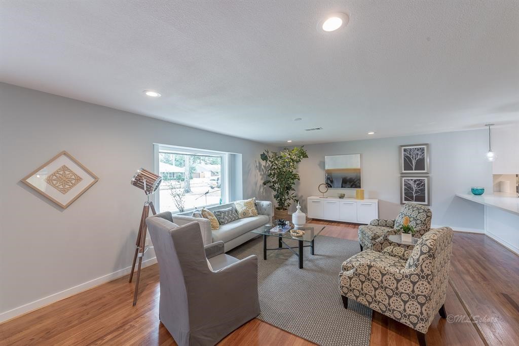10058 Larston Street Houston, TX 77055 - Photo 5 of 18 a living room with furniture and a window